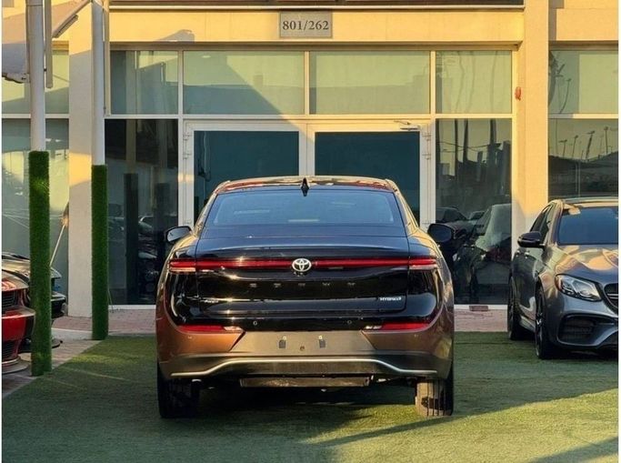 New Toyota Crown XVI (S230), 2.5 l, 2023 in Sharjah by Noor Al Seyoh Used Cars, Brown color. GCC Specs | AUTO.AE