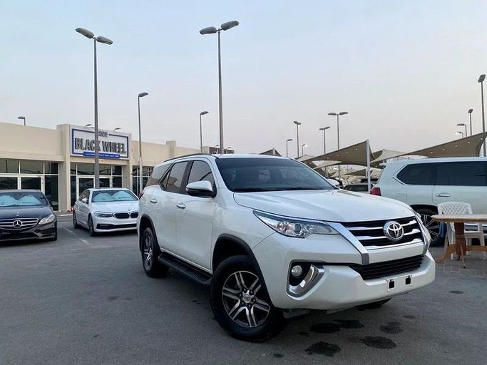 Used Toyota Fortuner II, 2.7 l, 2019 in Sharjah by Black Wheel Used Cars, White color. GCC Specs | AUTO.AE