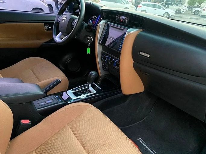 Used Toyota Fortuner II, 2.7 l, 2019 in Sharjah by Black Wheel Used Cars, White color. GCC Specs | AUTO.AE