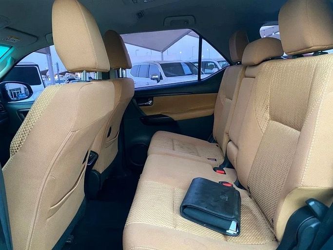 Used Toyota Fortuner II, 2.7 l, 2019 in Sharjah by Black Wheel Used Cars, White color. GCC Specs | AUTO.AE