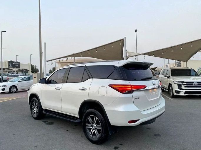 Used Toyota Fortuner II, 2.7 l, 2019 in Sharjah by Black Wheel Used Cars, White color. GCC Specs | AUTO.AE