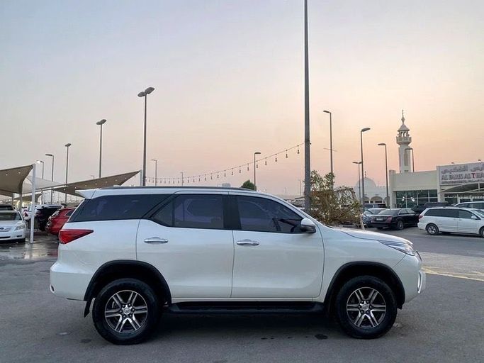 Used Toyota Fortuner II, 2.7 l, 2019 in Sharjah by Black Wheel Used Cars, White color. GCC Specs | AUTO.AE