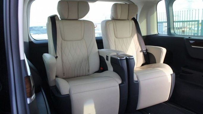 New Toyota Granvia II, 2.8 l, 2024 in Sharjah by Nour Alnukhba Motors, Black color. GCC Specs | AUTO.AE