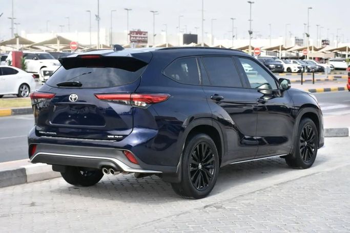 Used Toyota Highlander IV (U70), 2.0 l, 2023 in Sharjah by Alfaris Used Cars, Blue color. Other | AUTO.AE