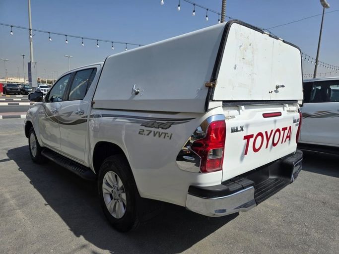 Подержанный Toyota Hilux VIII, 2.7 л, 2017 в Шардже от Rebou Najd Used Cars Белый цвет. GCC | AUTO.AE