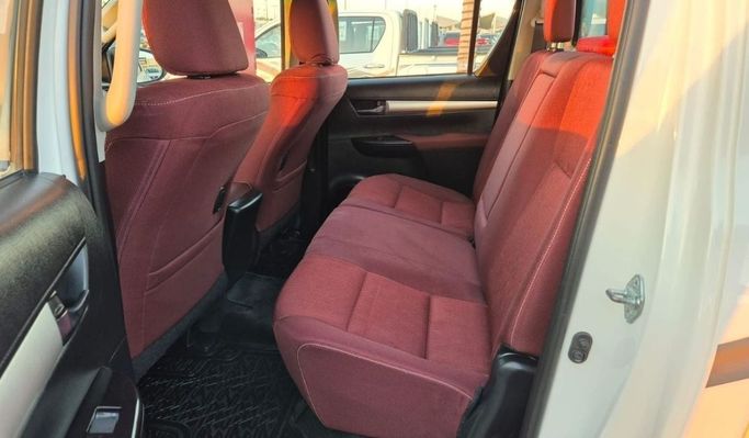 Used Toyota Hilux VIII Facelift, 2.7 l, 2024 in Sharjah by Rebou Najd Used Cars, White color. GCC Specs | AUTO.AE