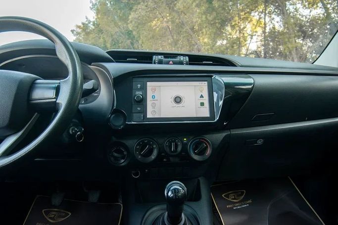Used Toyota Hilux VIII Facelift, 2.7 l, 2021 in Sharjah by First Choice Cars, White color. GCC Specs | AUTO.AE