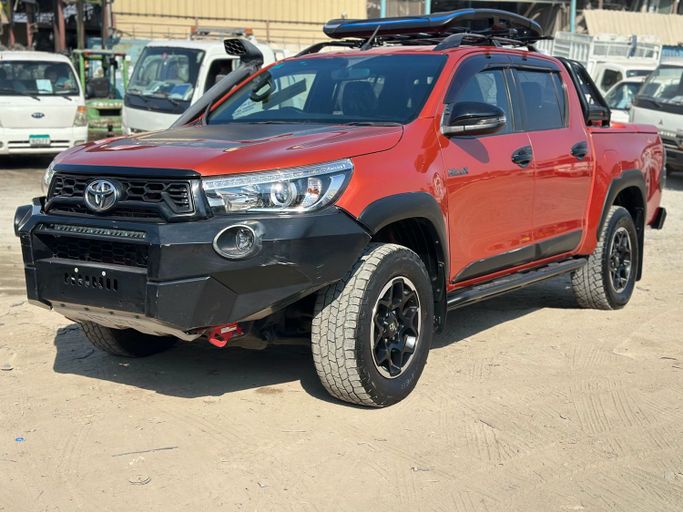 Used Toyota Hilux VIII, 2.8 l, 2018 in Sharjah, Orange color. Australian Specs | AUTO.AE