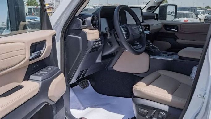 New Toyota Land Cruiser Prado 250 Series, 2.4 l, 2025 in Sharjah by Nour Alnukhba Motors, White color. GCC Specs | AUTO.AE