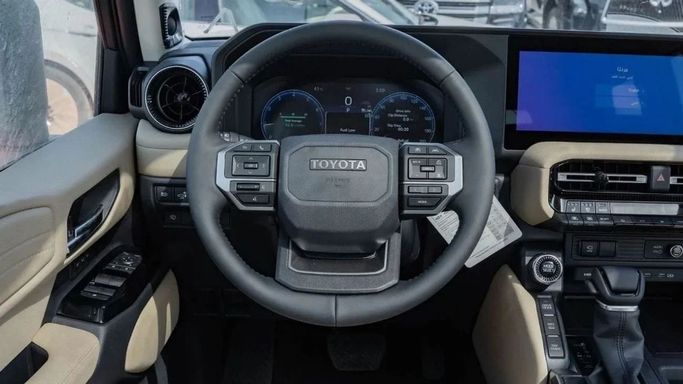 New Toyota Land Cruiser Prado 250 Series, 2.4 l, 2025 in Sharjah by Nour Alnukhba Motors, White color. GCC Specs | AUTO.AE