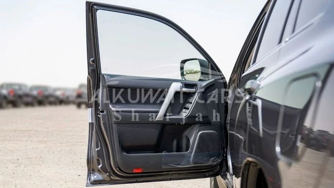 New Toyota Land Cruiser Prado 150 Series Facelift 3, 4.0 l, 2023 in Sharjah by Nour Alnukhba Motors, Grey color. GCC Specs | AUTO.AE