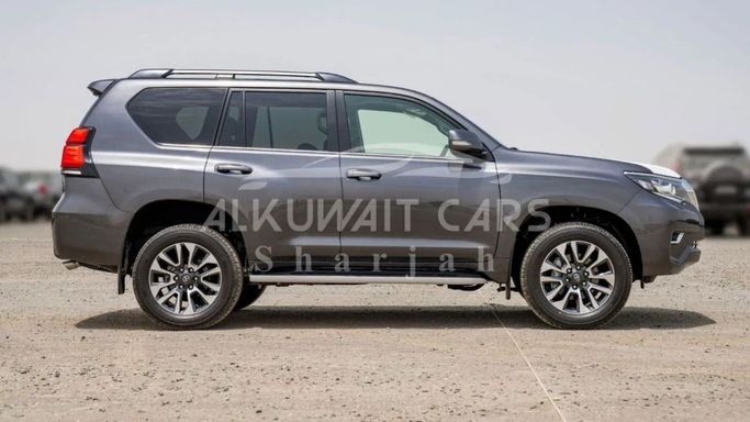 New Toyota Land Cruiser Prado 150 Series Facelift 3, 4.0 l, 2023 in Sharjah by Nour Alnukhba Motors, Grey color. GCC Specs | AUTO.AE