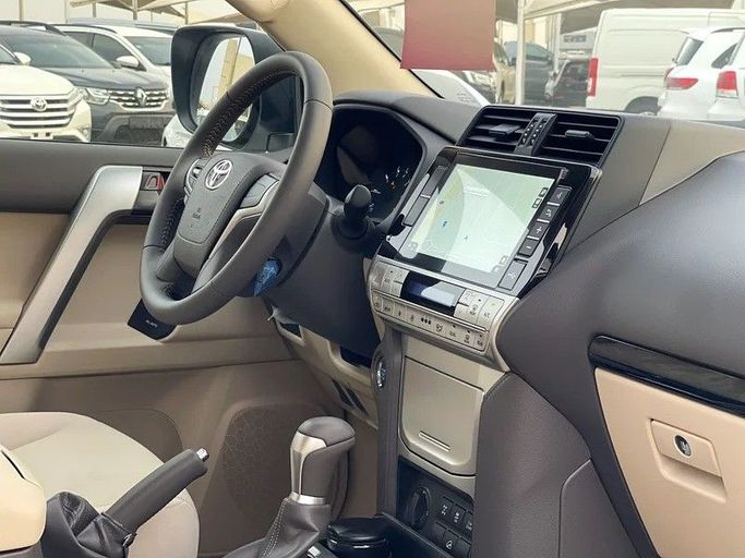 New Toyota Land Cruiser Prado 150 Series Facelift 3, 4.0 l, 2023 in Sharjah by Darb Al Saada Used cars, White color. GCC Specs | AUTO.AE