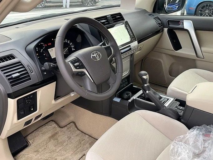 New Toyota Land Cruiser Prado 150 Series Facelift 3, 4.0 l, 2023 in Sharjah by Darb Al Saada Used cars, White color. GCC Specs | AUTO.AE