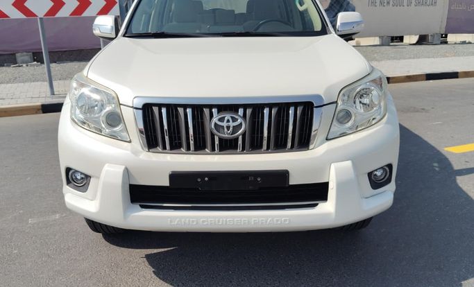 مستعملة ⁦Toyota Land Cruiser Prado 150 Series 150 Series Facelift 1، 4.0 l، 2013⁩ في في الإمارات, الشارقة من VIRGINIA، اللون أبيض. مواصفات الخليج | AUTO.AE | إعلان #288893