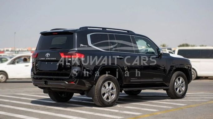 New Toyota Land Cruiser 300 Series, 3.4 l, 2024 in Sharjah by Nour Alnukhba Motors, Black color. GCC Specs | AUTO.AE
