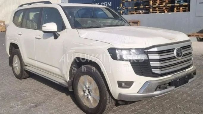 New Toyota Land Cruiser 300 Series, 4.0 l, 2025 in Sharjah by Nour Alnukhba Motors, White color. GCC Specs | AUTO.AE
