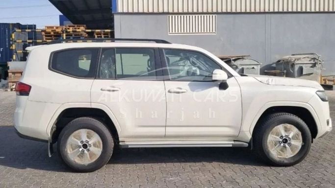 New Toyota Land Cruiser 300 Series, 4.0 l, 2025 in Sharjah by Nour Alnukhba Motors, White color. GCC Specs | AUTO.AE