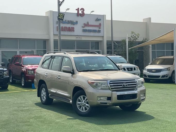 Used Toyota Land Cruiser 200 Series, 4.6 l, 2010 in Sharjah by Badar Used Cars, Tan color.  | AUTO.AE
