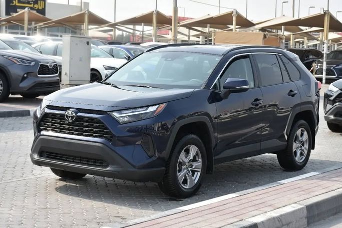 Подержанный Toyota RAV4 V (XA50), 2.5 л, 2022 в Шардже от Alfaris Used Cars Синий цвет. Other | AUTO.AE