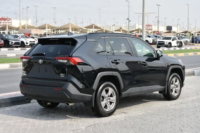 Подержанный Toyota RAV4 V (XA50), 2.5 л, 2022 в Шардже от Alfaris Used Cars Черный цвет. Other | AUTO.AE