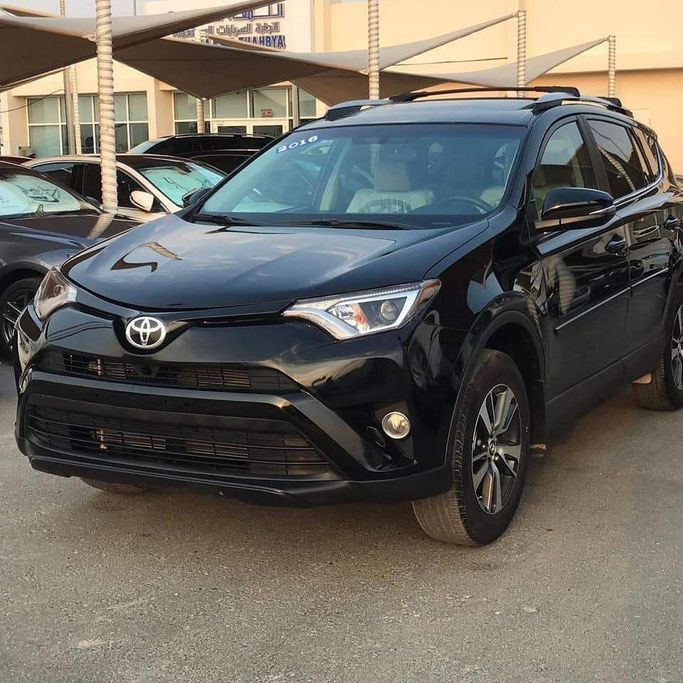 Used Toyota RAV4 IV (XA40) Facelift, 2.5 l, 2016 in Sharjah by Al Nukhba Al Malakyah Used Cars, Black color. American Specs | AUTO.AE