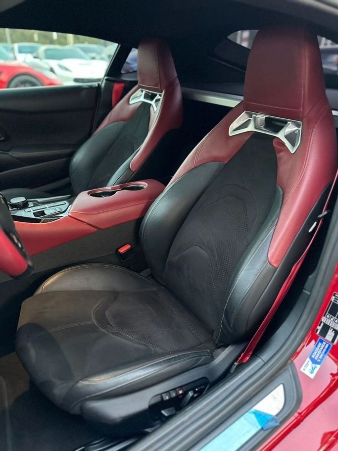 Подержанный Toyota Supra V (A90), 3.0 л, 2023 в Шардже от Noor Al Seyoh Used Cars Красный цвет. GCC | AUTO.AE