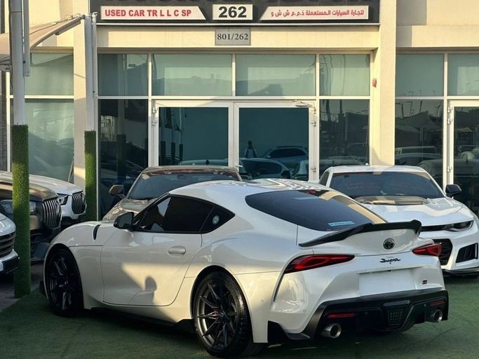 Used Toyota Supra V (A90), 3.0 l, 2024 in Sharjah by Noor Al Seyoh Used Cars, White color. GCC Specs | AUTO.AE