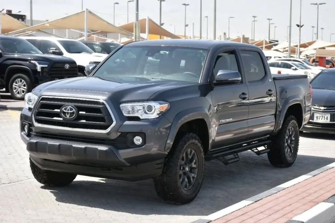 Used Toyota Tacoma III, 3.5 l, 2023 in Sharjah by Alfaris Used Cars, Grey color. Other | AUTO.AE