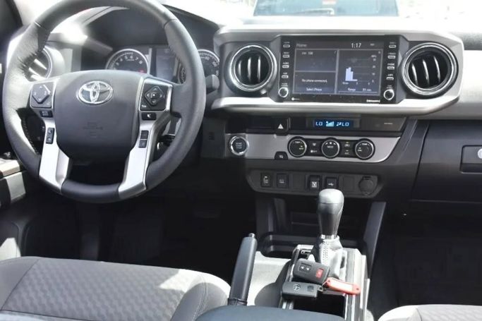 Used Toyota Tacoma III, 3.5 l, 2023 in Sharjah by Alfaris Used Cars, Grey color. Other | AUTO.AE