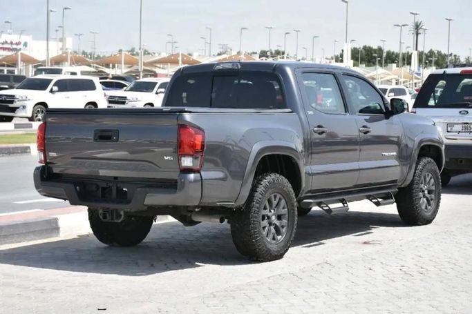 Used Toyota Tacoma III, 3.5 l, 2023 in Sharjah by Alfaris Used Cars, Grey color. Other | AUTO.AE
