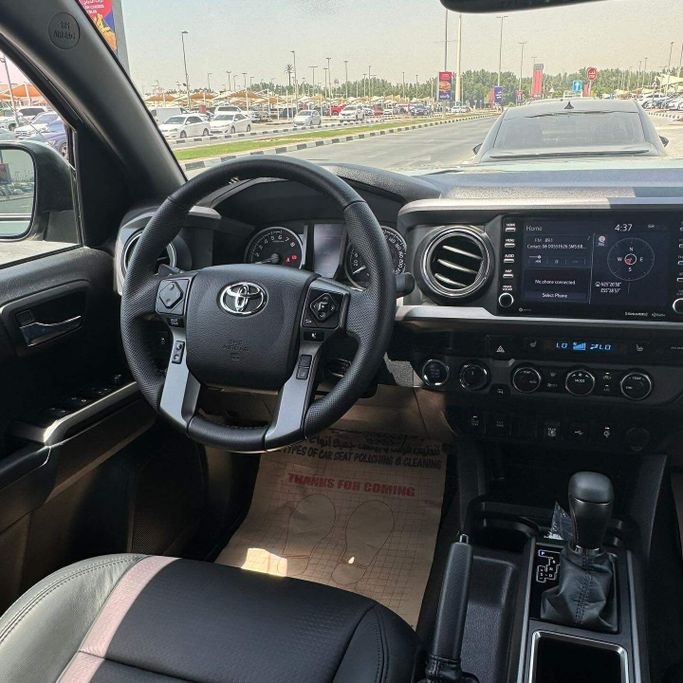 Подержанный Toyota Tacoma III, 3.5 л, 2023 в Шардже от Alfaris Used Cars Зеленый цвет. Other | AUTO.AE