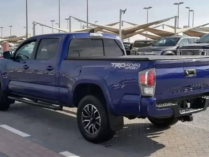 Used Toyota Tacoma III, 3.5 l, 2022 in Sharjah by Alfaris Used Cars, Blue color. Other | AUTO.AE