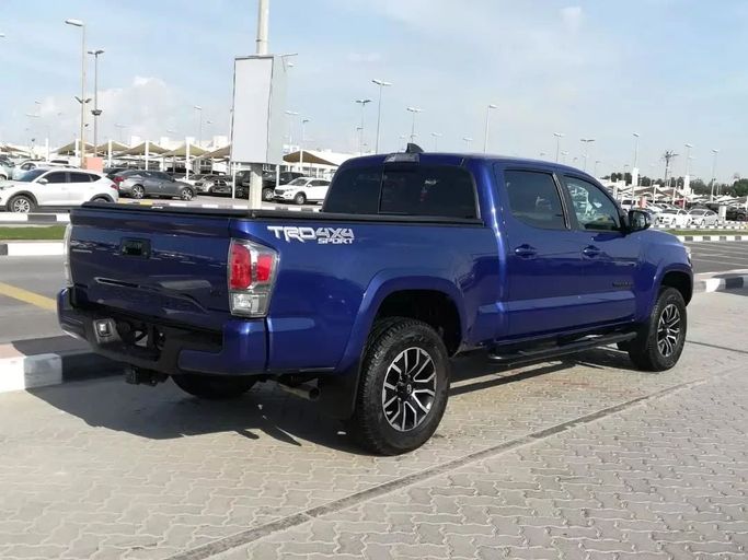 Подержанный Toyota Tacoma III, 3.5 л, 2022 в Шардже от Alfaris Used Cars Синий цвет. Other | AUTO.AE