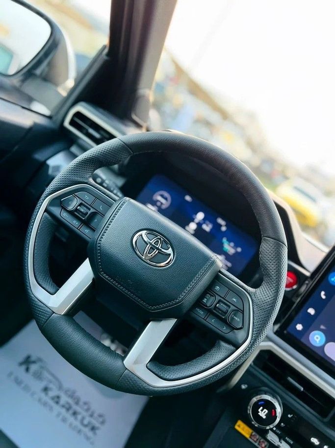 Used Toyota Tacoma IV, 2.4 l, 2024 in Sharjah by Karkuk Used Cars, White color. American Specs | AUTO.AE