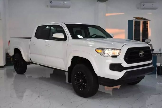 Подержанный Toyota Tacoma III, 3.5 л, 2020 в Шардже от Alfaris Used Cars Белый цвет. Other | AUTO.AE