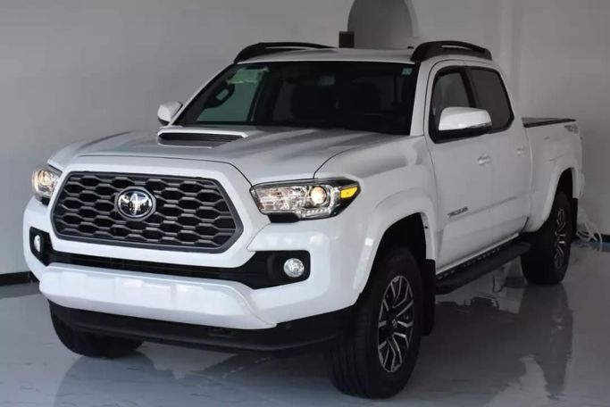 Подержанный Toyota Tacoma III, 3.5 л, 2020 в Шардже от Alfaris Used Cars Белый цвет. Other | AUTO.AE