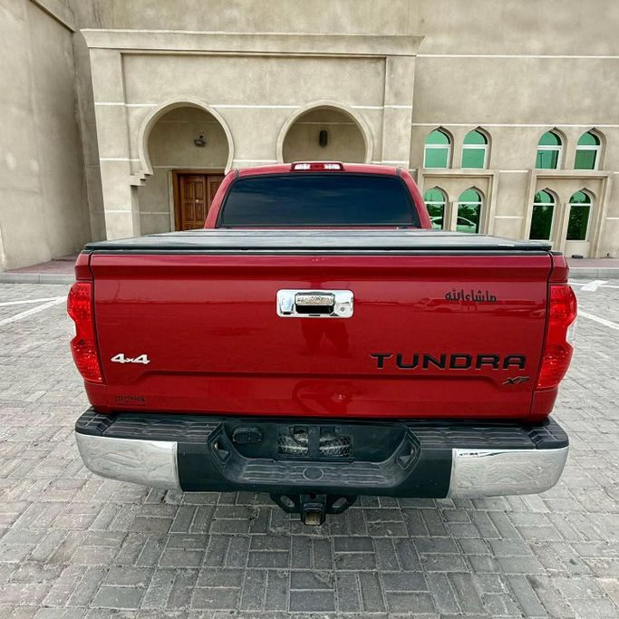 Подержанный Toyota Tundra II Рестайлинг, 5.7 л, 2018 в Шардже от Sarmad Cars Красный цвет. Other | AUTO.AE