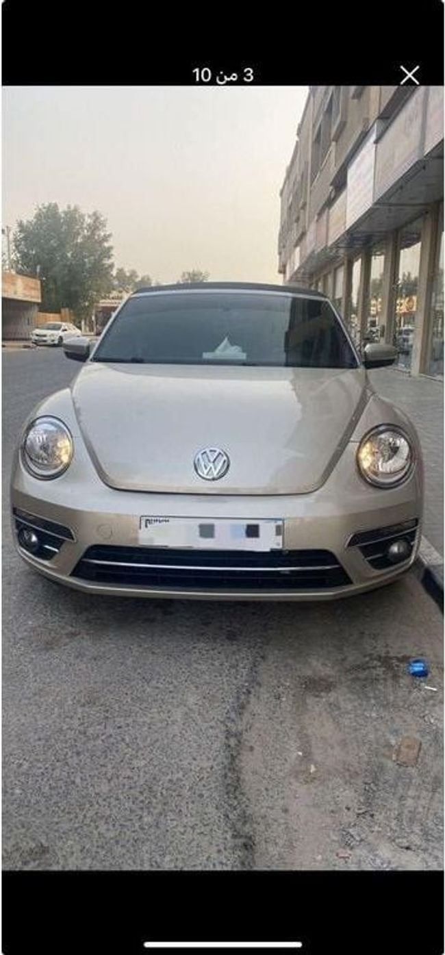 Used Volkswagen Beetle II (A5), 1.8 l, 2014 in Sharjah by Alnujoom Al Malakiah Used Cars, Golden color. American Specs | AUTO.AE