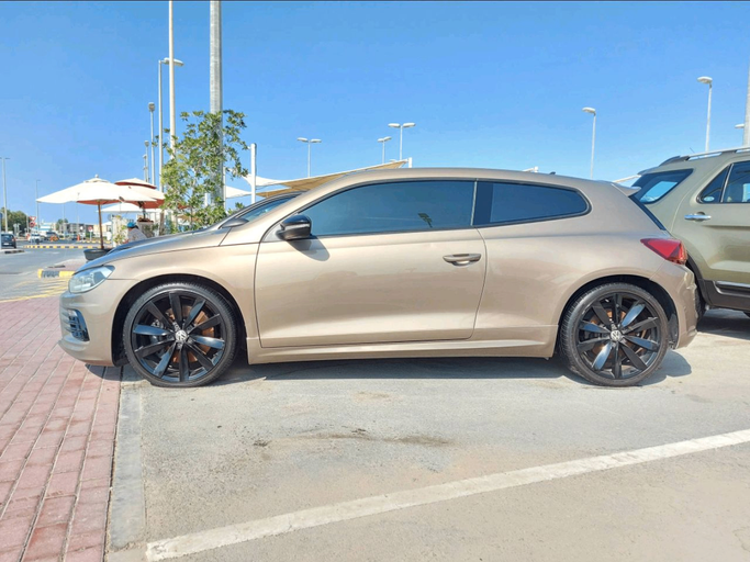 Used Volkswagen Golf GTI VII, 2.0 l, 2015 in Sharjah by Fantastic Used Cars, Golden color. GCC Specs | AUTO.AE