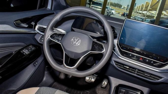 Подержанный Volkswagen ID.4, 2022 в Шардже от Alsalama Motors Серый цвет. Китайская | AUTO.AE