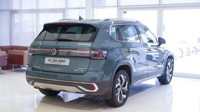 Подержанный Volkswagen Tharu I Рестайлинг, 1.5 л, 2023 в Шардже от Alsalama Motors Зеленый цвет. Китайская | AUTO.AE