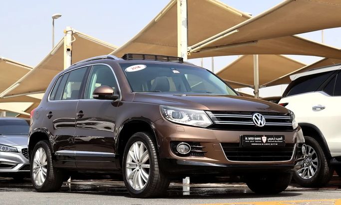 Подержанный ⁦Volkswagen Tiguan I Рестайлинг, 1.4 л, 2014⁩ в ОАЭ, Шарджа от Al Sayed Khamis Used Auto 57 Коричневый цвет. GCC | AUTO.AE | Объявление #293560