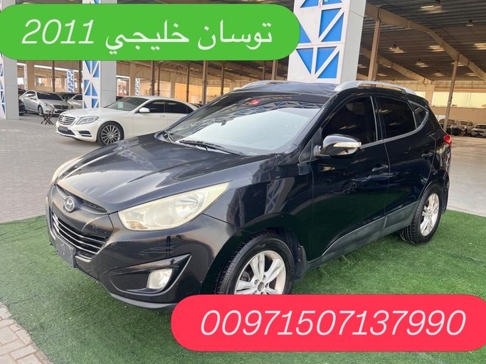 مستعملة ⁦Hyundai Tucson ثانياً، 2.0 l، 2011⁩ في في الإمارات, أم القيوين، اللون أسود. مواصفات الخليج | AUTO.AE | إعلان #287726