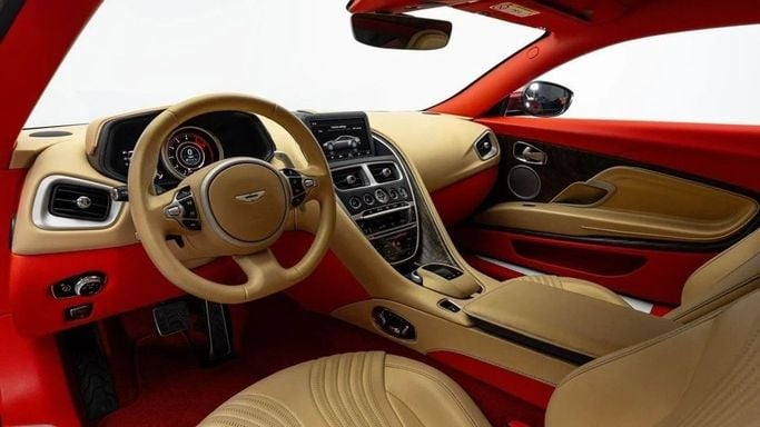 Used Aston Martin DB11 I, 5.2 l, 2018 in Dubai by Al Ain Class Motors, Red color. GCC Specs | AUTO.AE