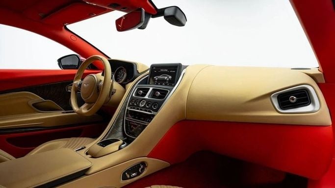 Used Aston Martin DB11 I, 5.2 l, 2018 in Dubai by Al Ain Class Motors, Red color. GCC Specs | AUTO.AE