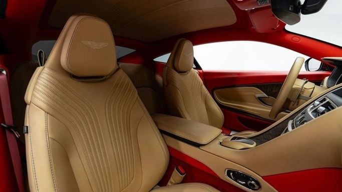 Used Aston Martin DB11 I, 5.2 l, 2018 in Dubai by Al Ain Class Motors, Red color. GCC Specs | AUTO.AE