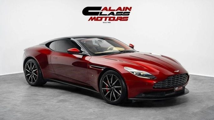 Used Aston Martin DB11 I, 5.2 l, 2018 in Dubai by Al Ain Class Motors, Red color. GCC Specs | AUTO.AE