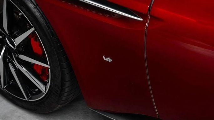 Used Aston Martin DB11 I, 5.2 l, 2018 in Dubai by Al Ain Class Motors, Red color. GCC Specs | AUTO.AE