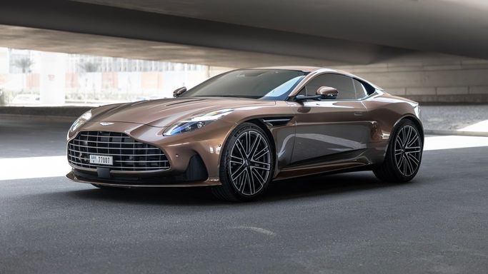 Aston Martin DB12, 2023 sport coupe for rent in Dubai by AVA car rental, beige color | AUTO.AE